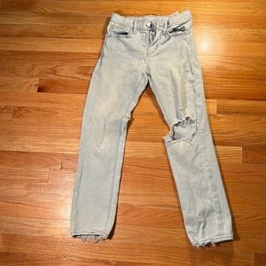 Light blue ripped jeans